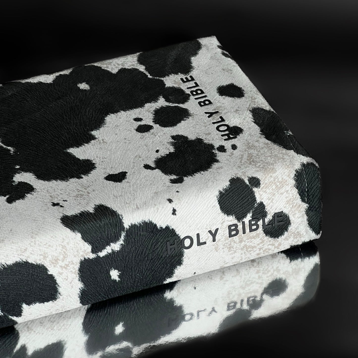 REDEEMED BLACK COW PRINT BIBLE COVER