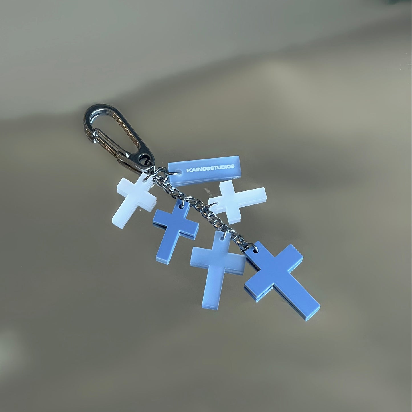 FROSTED BLUE CROSS CHARM KEYCHAIN
