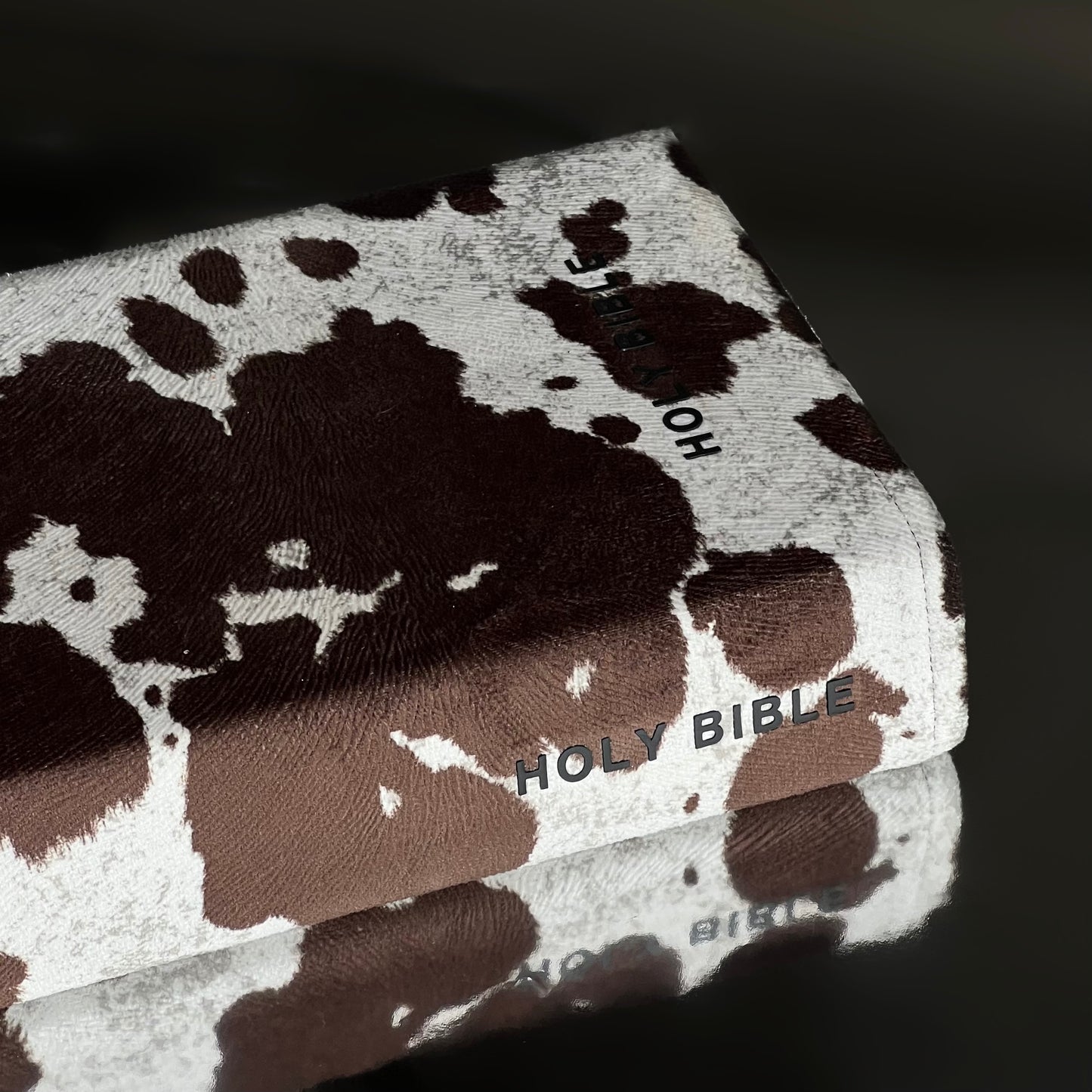 REDEEMED BROWN COW PRINT BIBLE COVER