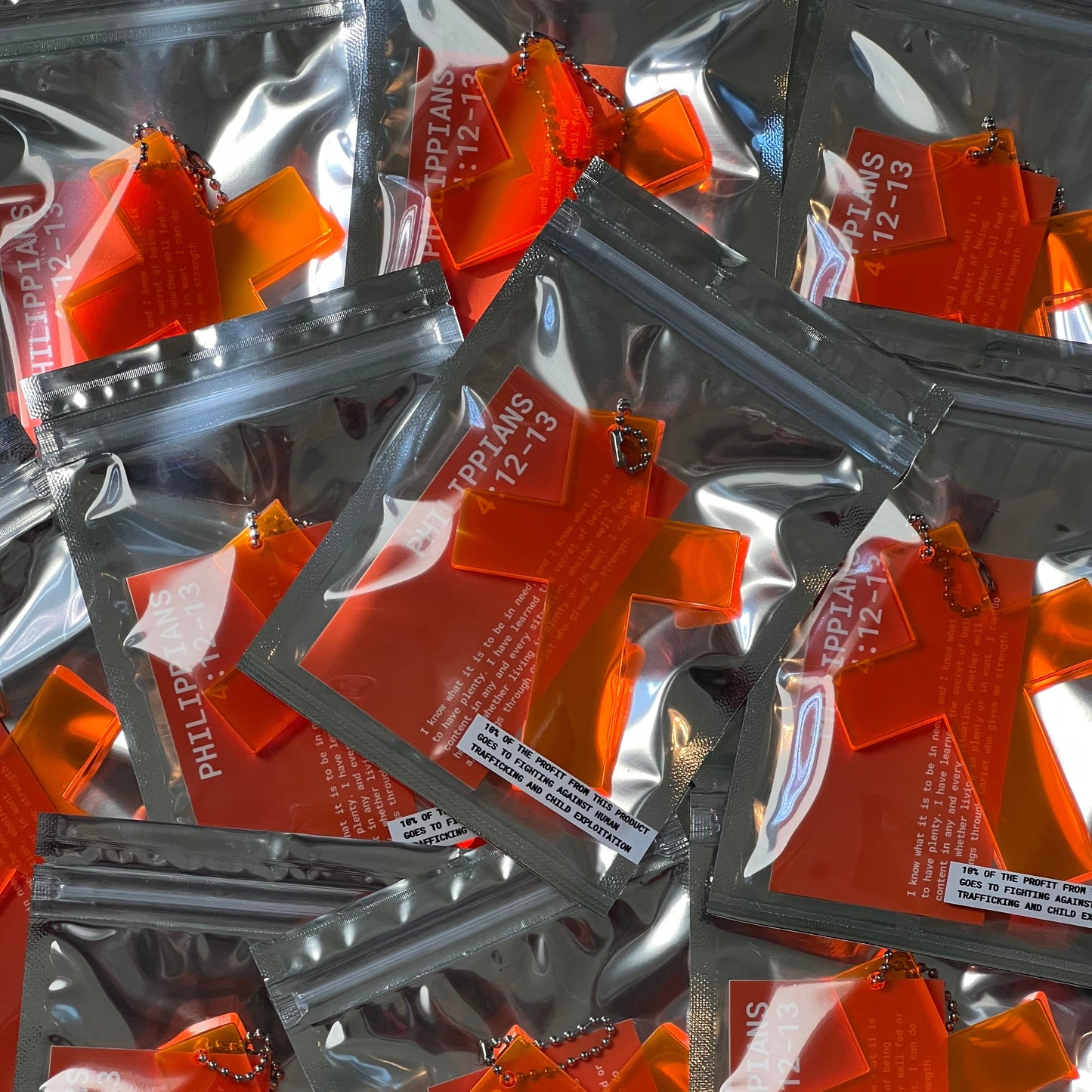 LARGE ORANGE CROSS KEYCHAIN