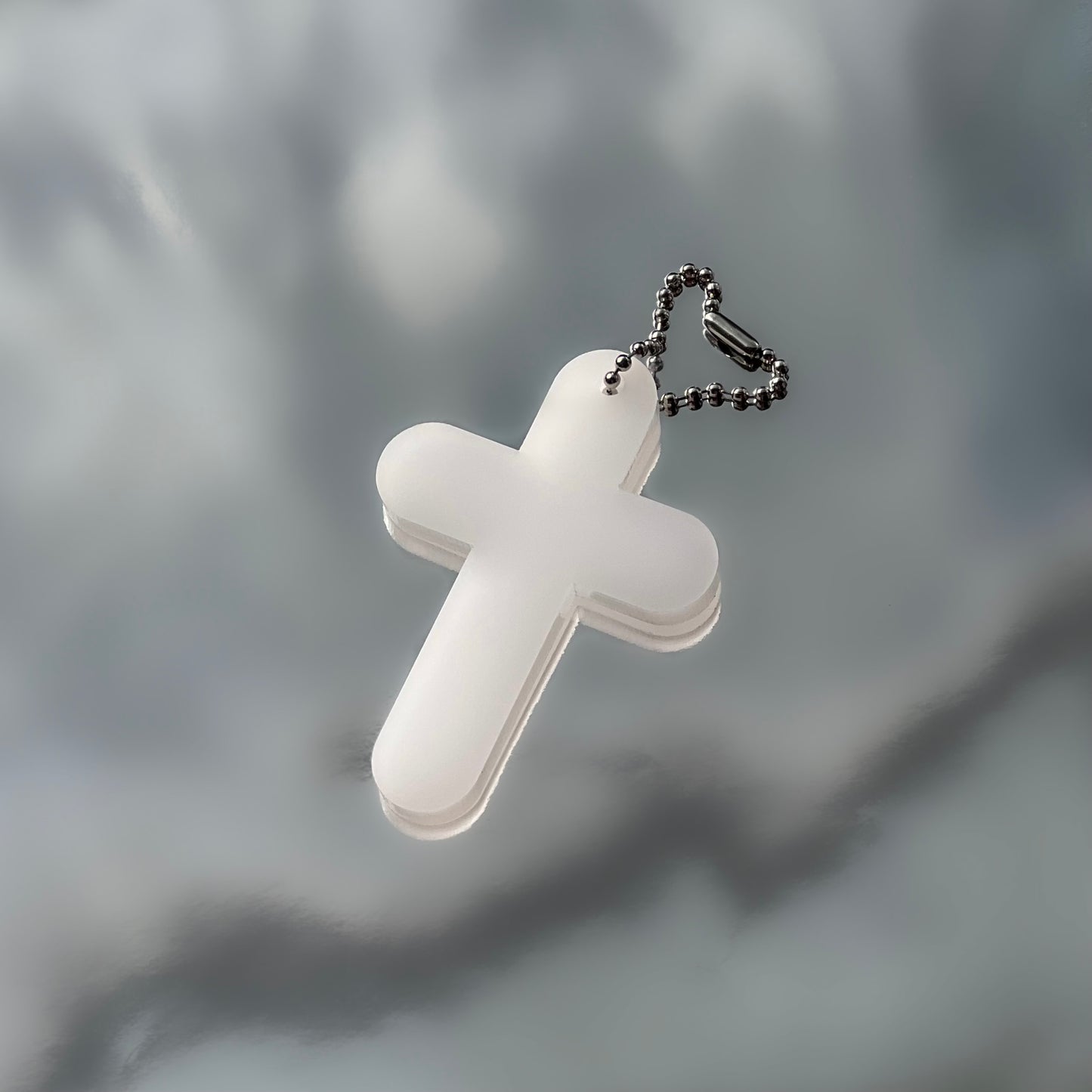 MILKLY WHITE CROSS KEYCHAIN